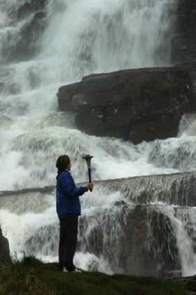 Runner facing waterfall