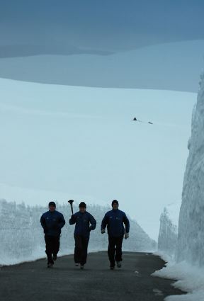 Climbing up snowy road