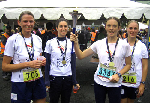 Team member Garbitashri Webster (womens second place) holds the torch