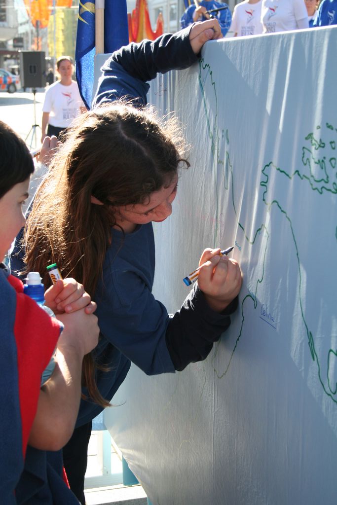 Signing the map.